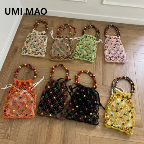 

UMI MAO Дизайнерские сумки Нишевый дизайн DIY Чистое плетение ручной работы Сумка из рыболовной сети Дофаминная сумка с одинаковыми цветами из бисера