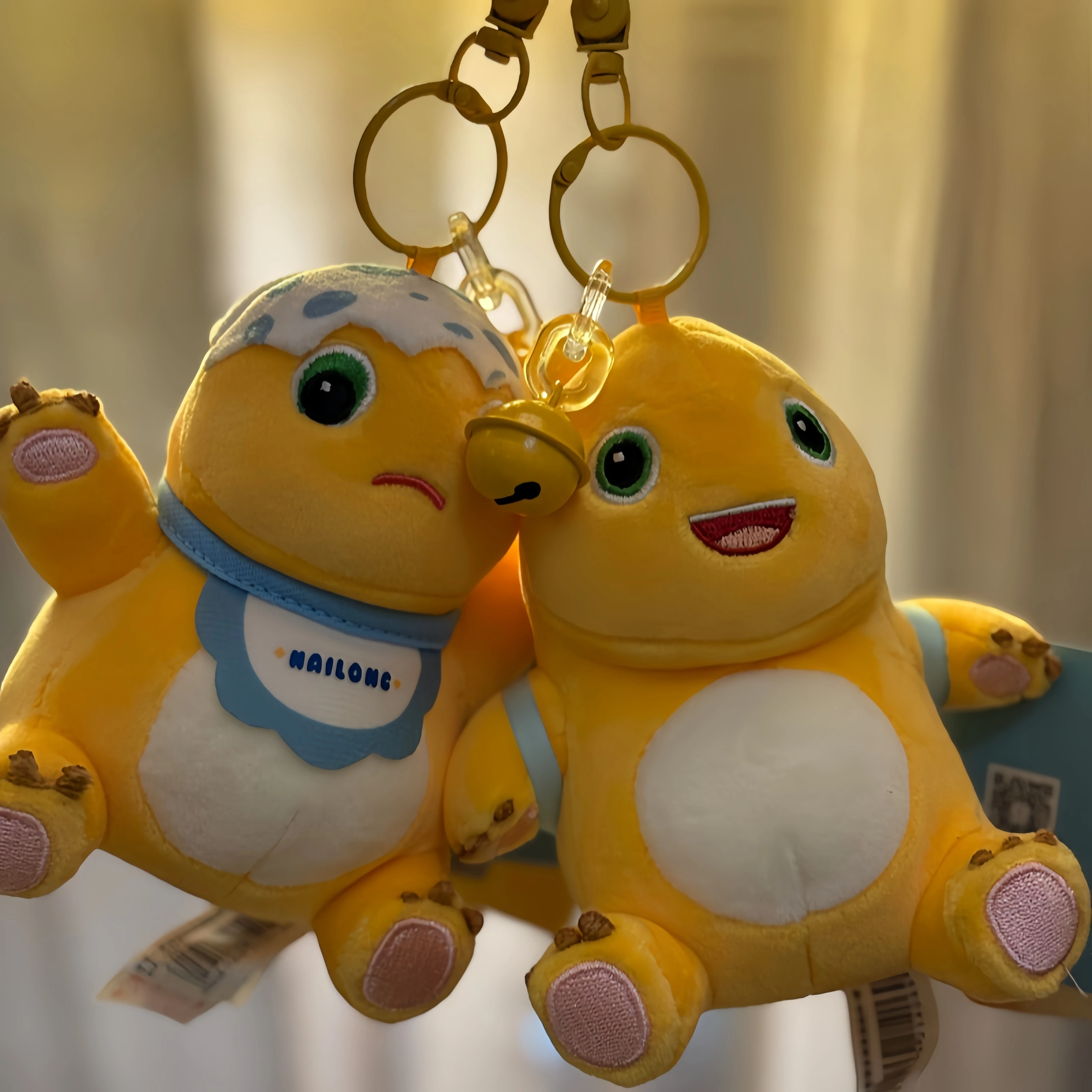 Bonito nailong dos desenhos animados leite dragão pingente de pelúcia brinquedo animal de pelúcia dinossauro chaveiro saco acessório anime decoração crianças presente