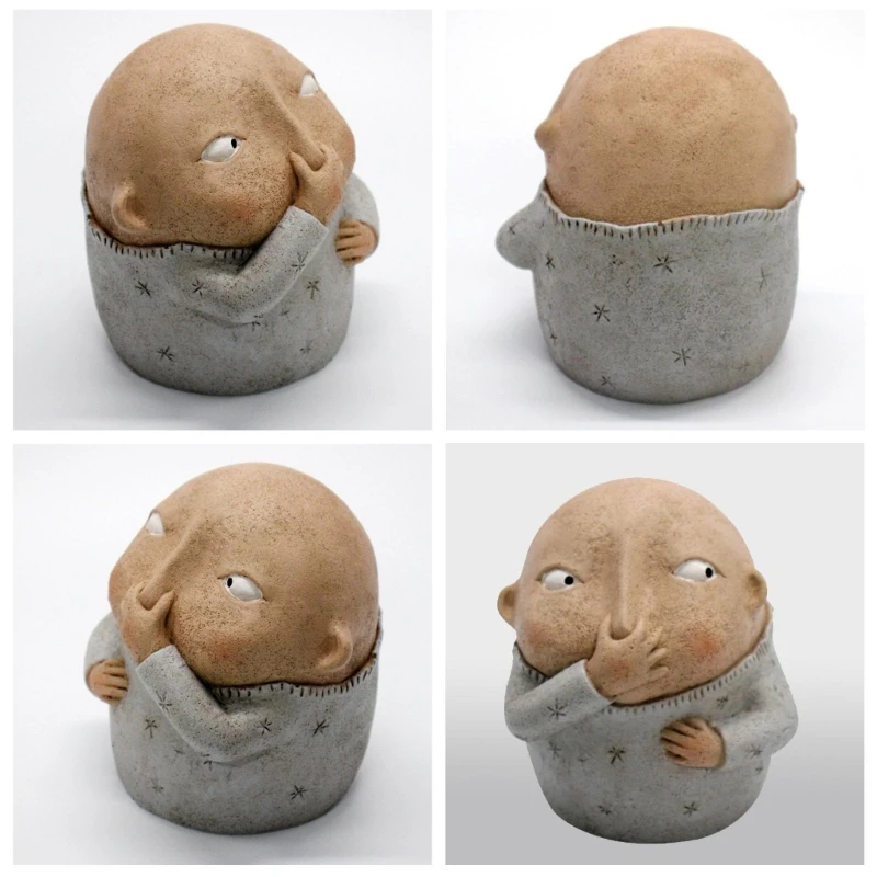 Niño creativo sosteniendo nariz escultura primitiva estatuilla estatua resina pintada a mano