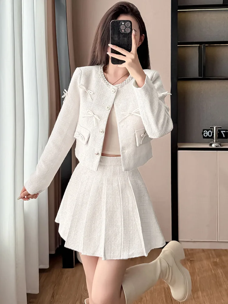 2025 الخريف الشتاء الاجتماعي النمط الكلاسيكي الثقيلة مطرز القوس سترة قصيرة عالية الخصر مطوي تنورة قطعتين مجموعات عالية الجودة