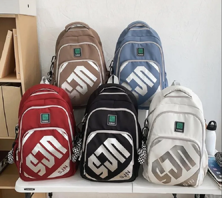 Mochilas de viaje de gran capacidad para hombres y mujeres, bolsos de hombro de nailon impermeables, bolso escolar para estudiantes, nueva moda