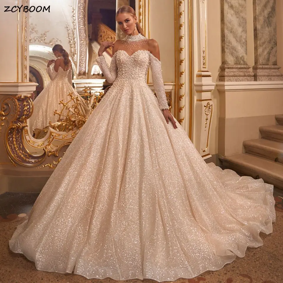

Luxury Beaded Halter Neck Ball Gown Wedding Dresses 2025 Sparkly Tulle Full Sleeves Chapel Train Bridal Gowns Vestido De Noiva