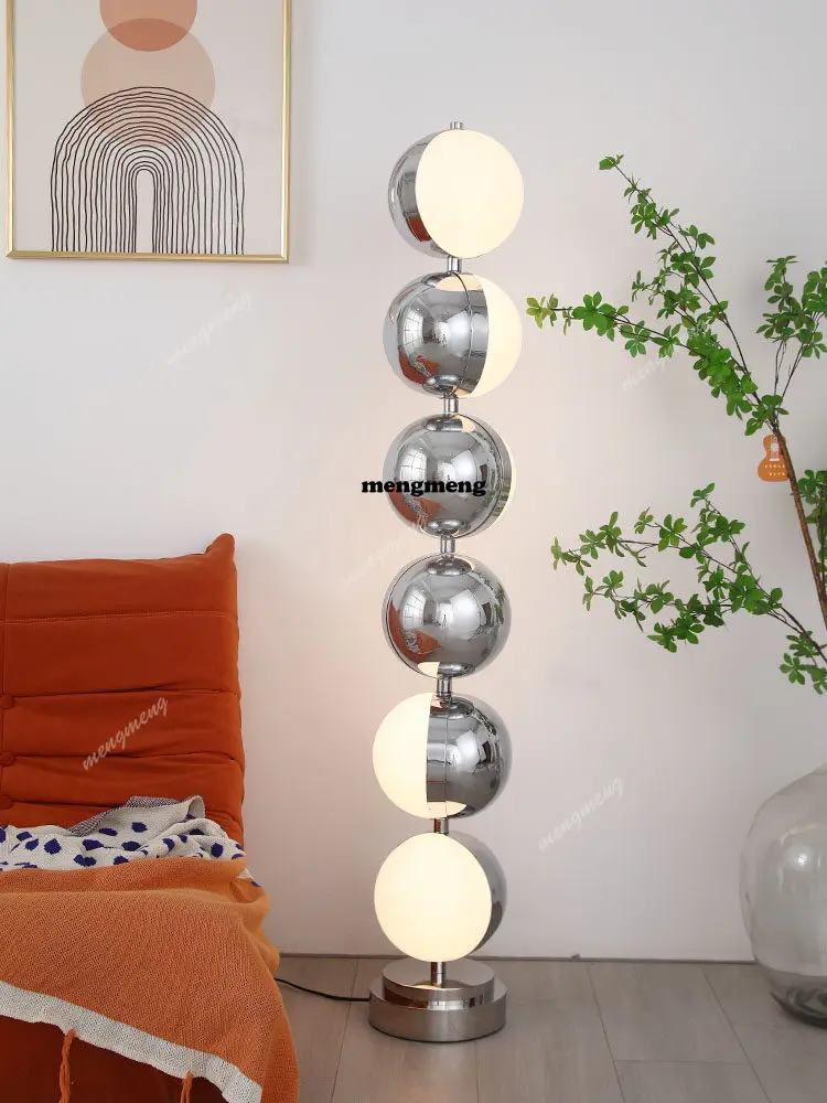 

Retro designer round ball floor lamp, living room model room stainless steel rotating floor lamp