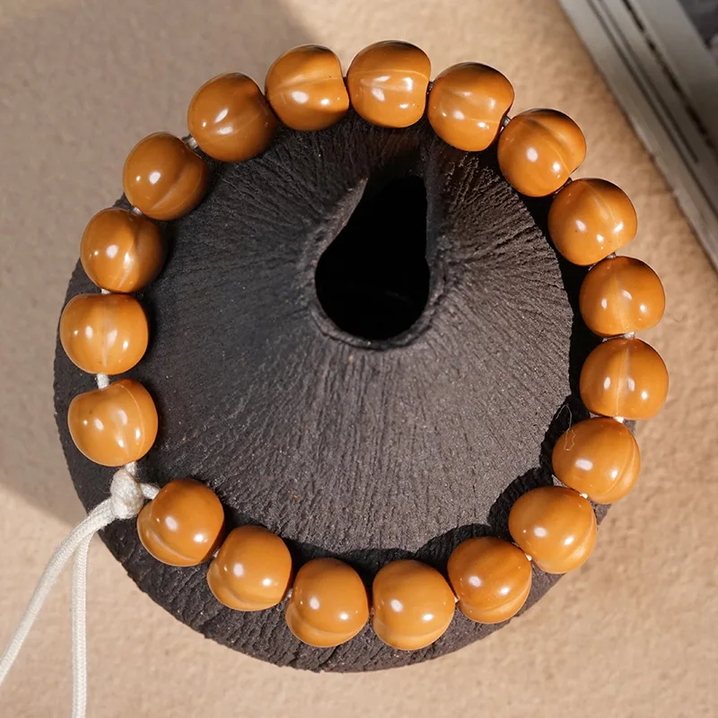 

Carved Raw Leather Peach Butt Monkey Head Walnut Single Circle Prayer Beads Bracelet for Men and Women Gifts