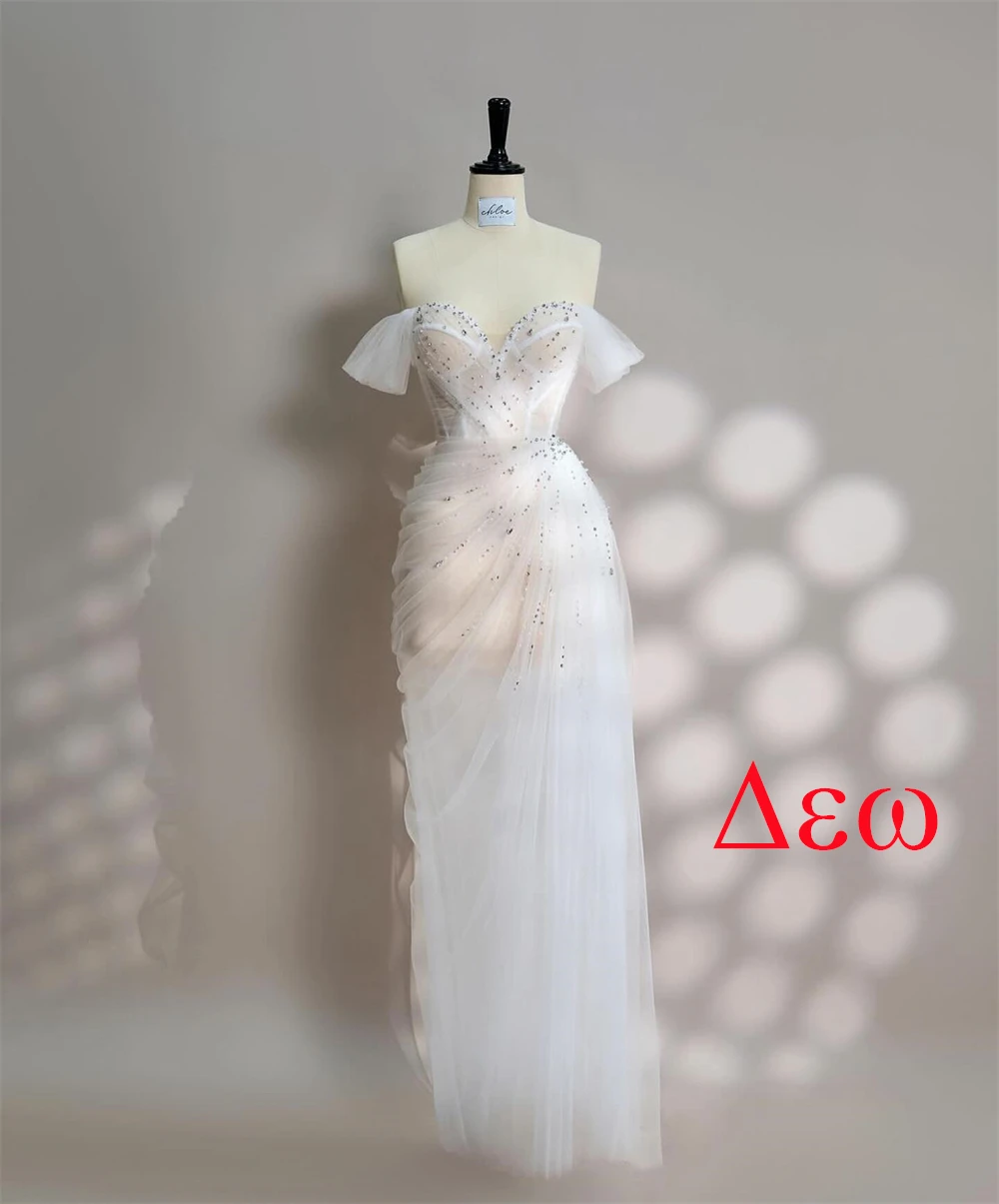 カスタマイズされた高級ホワイトオーガンザスパンコールのウェディングドレス絶妙なストラップレスオフショルダー半袖背中の開いたブライダルドレス