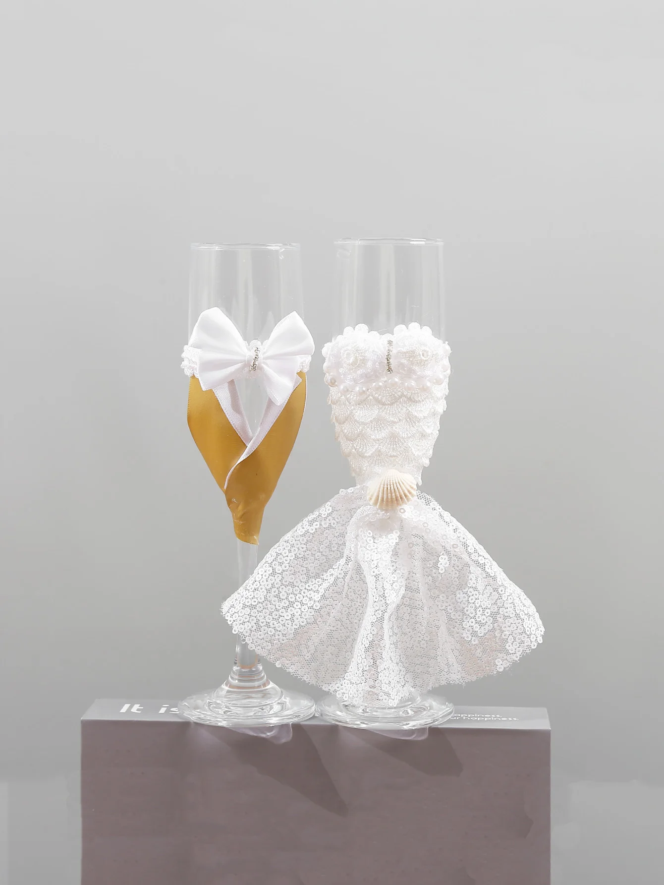 Two wedding champagne glasses, glasses for the bride and groom's banquet, dress and wedding dress, suitable for marriage