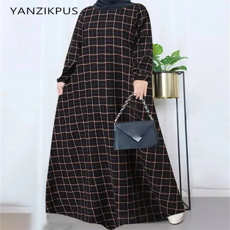 Muslim women's cotton and linen retro long sleeved plaid round neck sweeping dress casual and loose spring and autumn Dubai rob