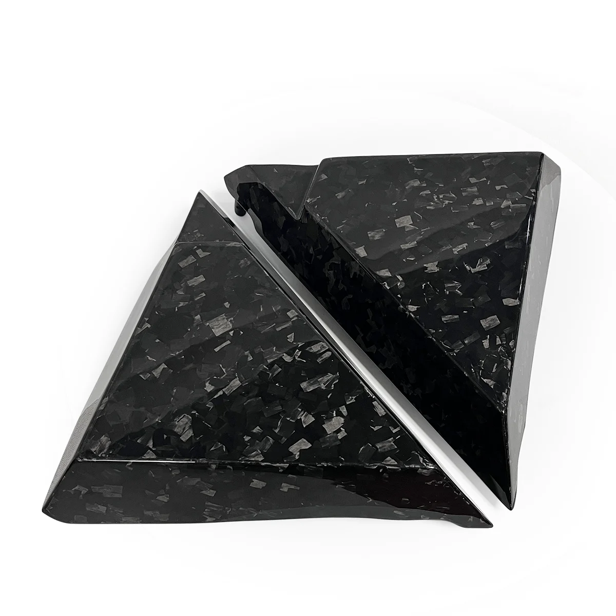 Forged gloss black carbon fiber side panel triangles for 2014-2023 Road Glide and Street Glide models.