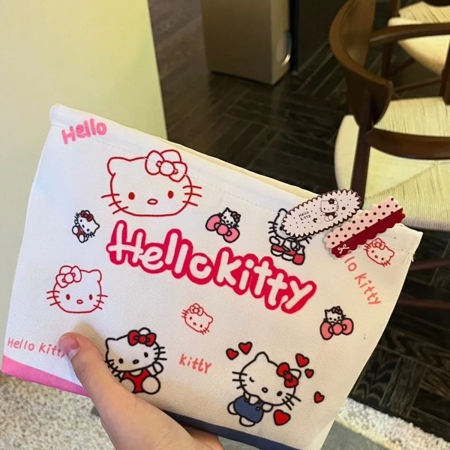 

2025 New Sanrio Original Kitty Cat Large Capacity Makeup Bag Portable Storage Bag Earphone Bag Zero Wallet (excluding pendants)