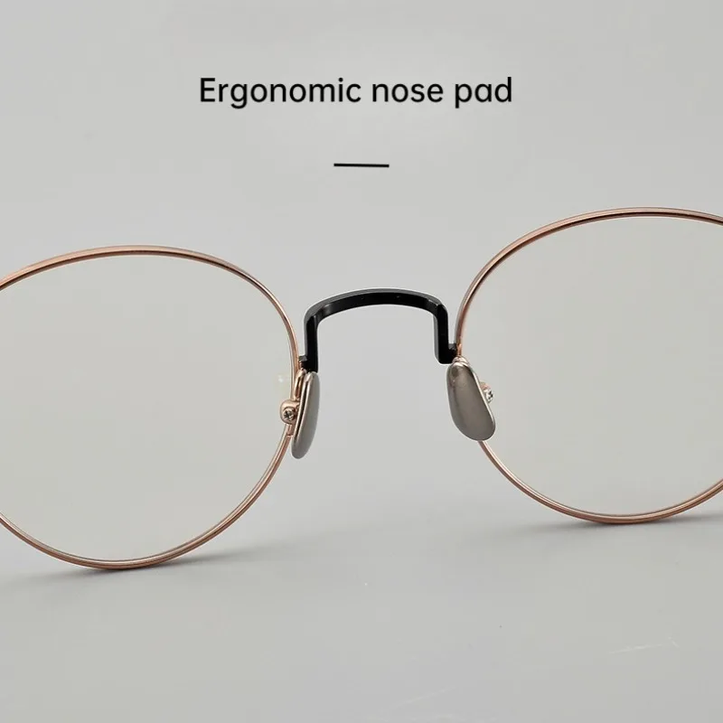 الاتجاه الجديد مصمم التيتانيوم النقي البيضاوي إطارات النظارات أزياء النساء النظارات بسيطة المتخصصة البصرية وصفة طبية إطارات النظارات
