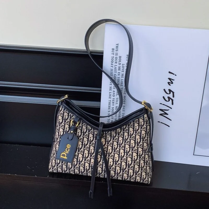 

2025 Women's Alphabet Print Backpack Niche Designer Large Capacity Adjustable Crossbody Strap Casual Commute Daypack