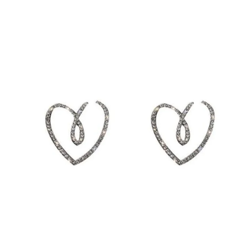 Pendientes exquisitos en forma de corazón para mujer, diseño hueco de circonita cúbica brillante, pendientes grandes para boda, joyería femenina