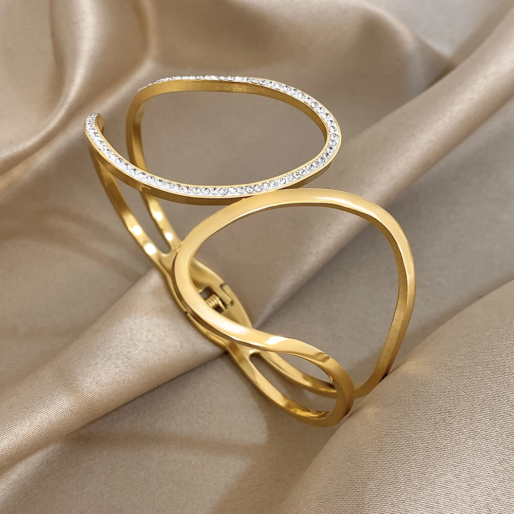 

Freetry New Trendy Hollow Out Stainless Steel Wide Bangle Women Elegant Rhinestone Geometric Cuff Spring Bracelet Party Jewelry