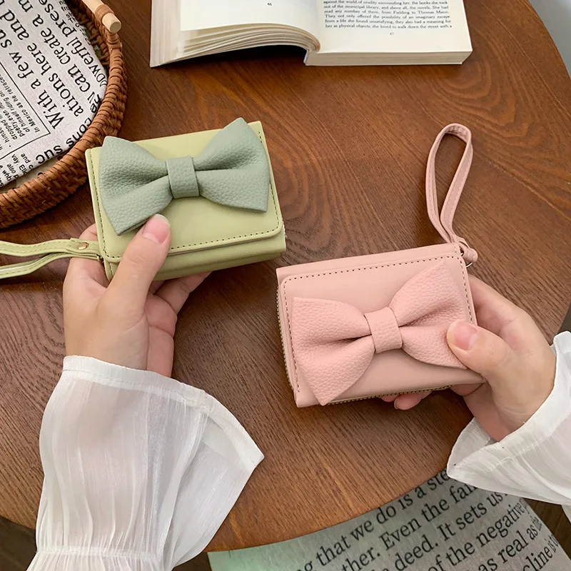 

Cute bow three-fold ladies' wallet, multi-functional large-capacity, thin and small change storage wallet, cute for students