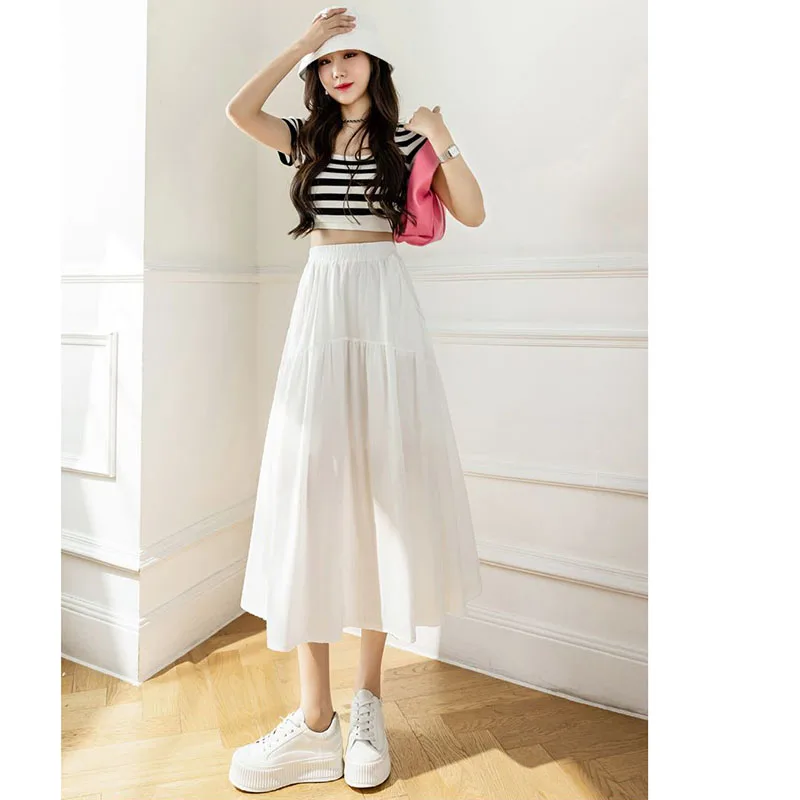 Saia midi branca para mulheres no verão 2025, novo design de cintura alta e emagrecimento, saia casual evasê que cobre os quadris
