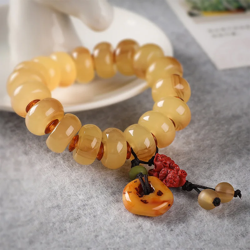 Tibetan-style sheep bracelet a unique souvenir made of synthetic resin featuring a cow horn design and includes a Buddhi