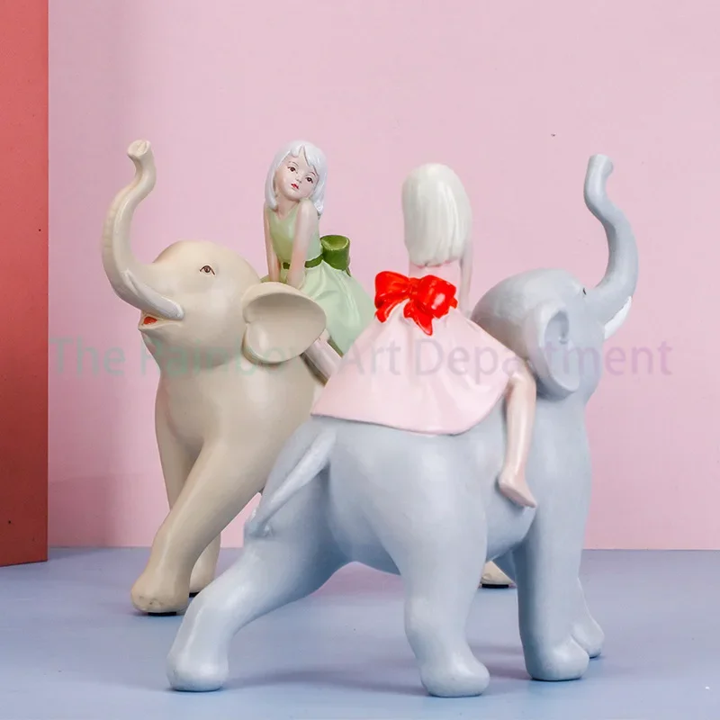 Small fresh riding elephant girl resin handicraft simulation animal European light luxury home TV cabinet desktop ornament