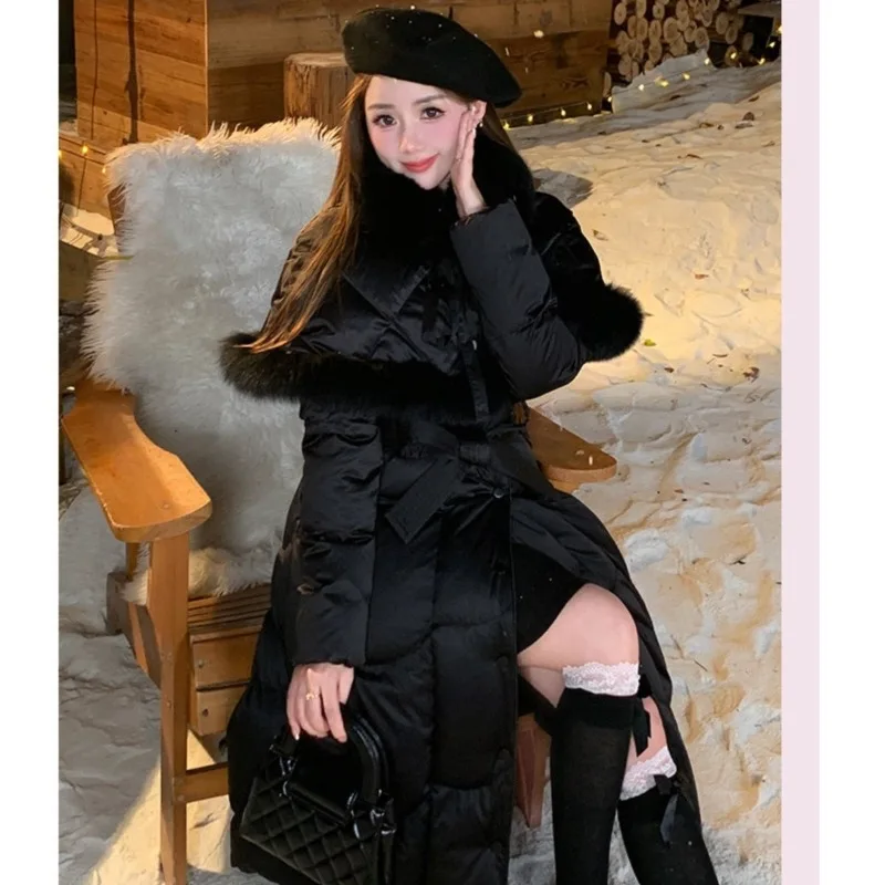 El nuevo cuello de piel de copia desmontable de alta gama con longitud media hasta la rodilla que cincha la cintura te hace parecer más delgado en abrigo de invierno