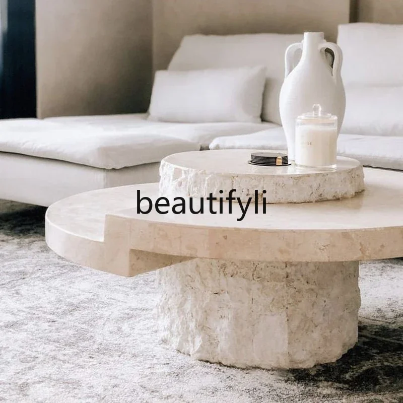 

Cream wind tunnel stone coffee table creative round wabi-sabi wind living room home light luxury high sense