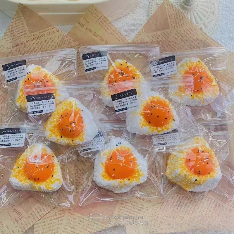 لعبة إسفنجية لصفار البيض - كرة ضغط من السيليكون الآمنة للطعام، لعبة كرة الأرز كاواي للقلق والتركيز