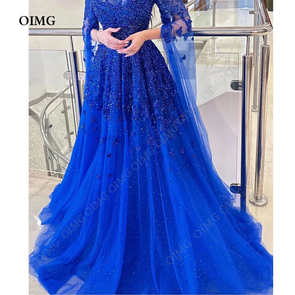 

OIMG Shiny Royal Blue Princess Quinceanera Dresses Beads Glitter Appliques Birthday Party Dress Sparkly Ball Gown Graduation