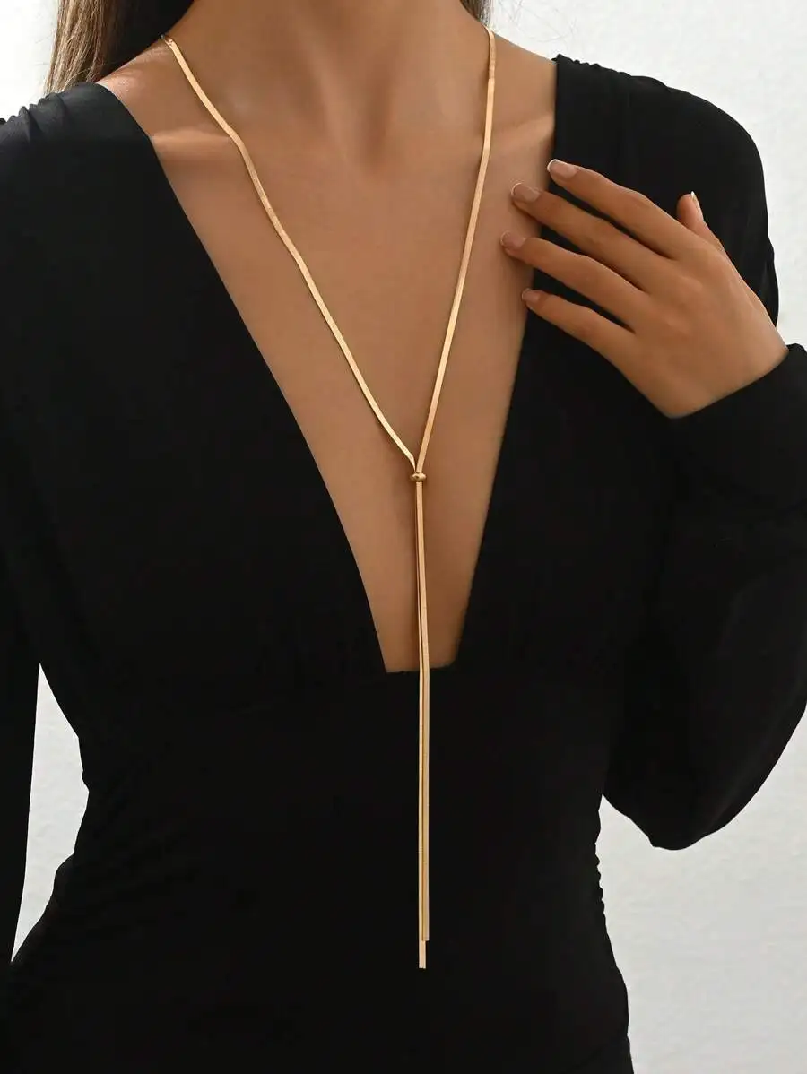 

Ожерелье-лариат золотистого цвета с цепочкой в виде змеи и регулируемой застежкой-узлом