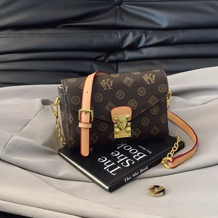 

Luxury Brand Handbag Simple Yet Stylish Also A Perfect High-End Diaper Bag For The Discerning Modern Woman