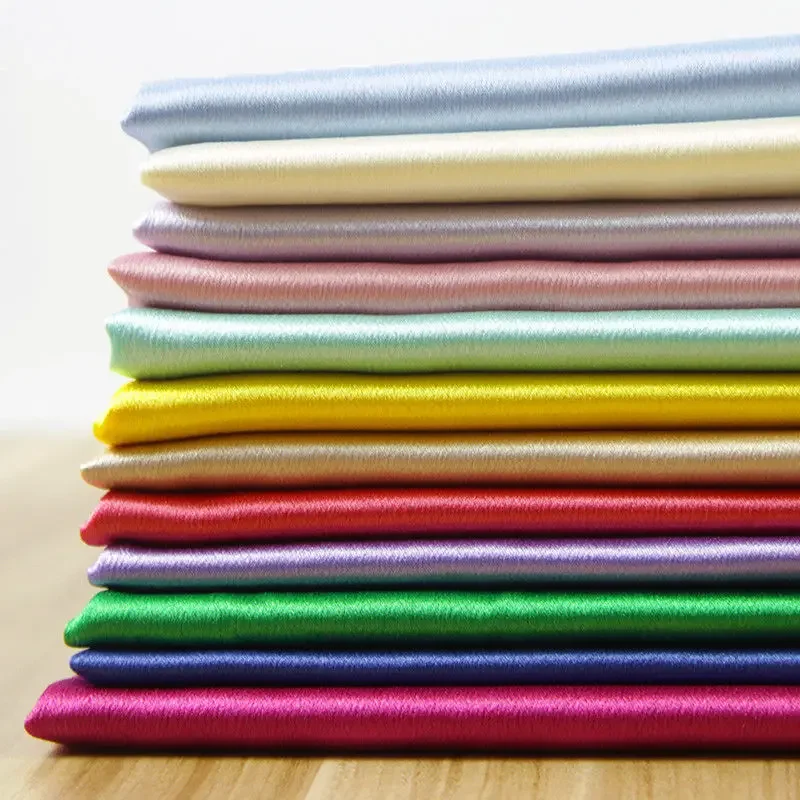 

Thick shiny crystal satin fabric solid color soft durable material for DIY stage backdrop curtain dress and high end clothing