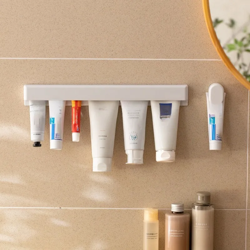 Toothpaste Holder and Facial Cleanser Wall Rack Wall Mount Bathroom Storage Rack For Household Use No Punching Toothpaste Clip