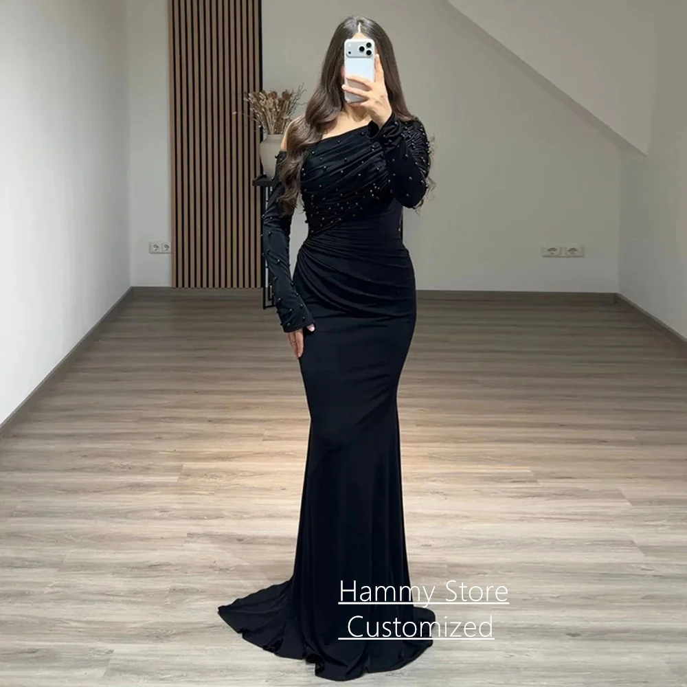 Modisches schwarzes Meerjungfrauen-Abendkleid, maßgeschneidert, One-Shoulder, lange Ärmel, Perlen, Falten, Schleppe, Ballkleid, Partykleid