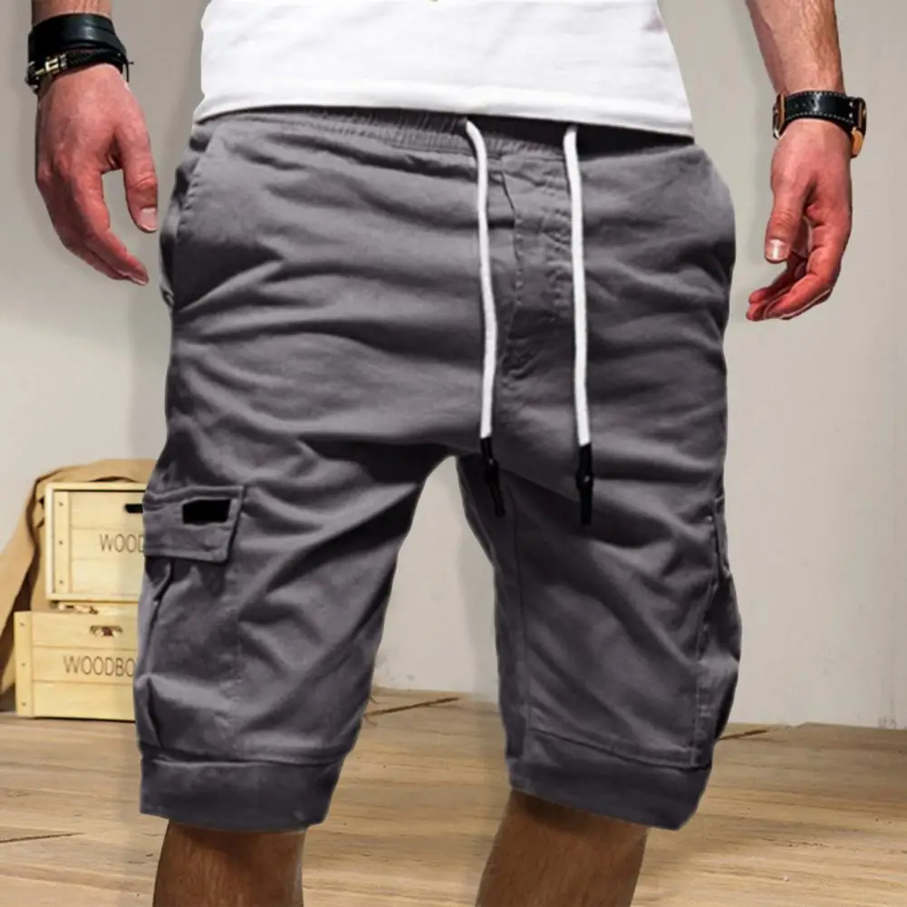 summer men's mid waist elastic drawstring solid color loose work pants shorts fashionable multi pocket street style work pants