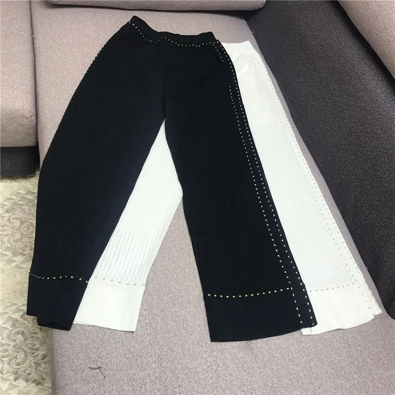 2024 donne bottone dorato scava fuori maglieria top + pantaloni a gamba larga 2 pezzi set Casual manica corta top maglieria pantaloni abiti