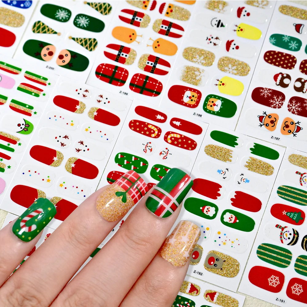 สติกเกอร์ติดเล็บลายคริสต์มาส 14 แบบ ลายสก็อต ลายจุด ลายเกล็ดหิมะ สีแดง สีเขียว ลายซานตาคลอส ประดับกลิตเตอร์สีทอง สำหรับตกแต่งเล็บ