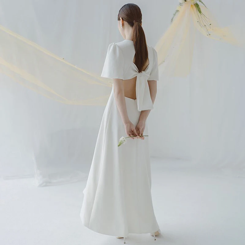 Elegante Eenvoudige A-lijn Half Mouwen Ronde Hals Vintage Soft Satin Hoog Laag Backless Sexy Trouwjurk Jurk Bridal Dress