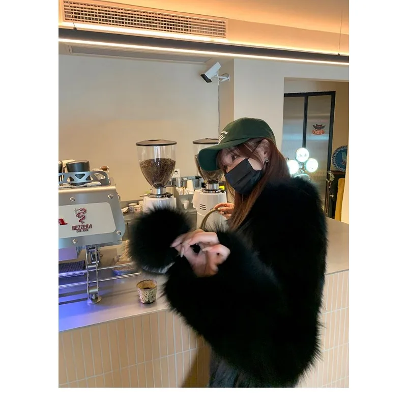 2025 nueva chaqueta de manga larga de otoño e invierno empalmado con cuello en V piel de zorro simulada moda suelta versátil Casual