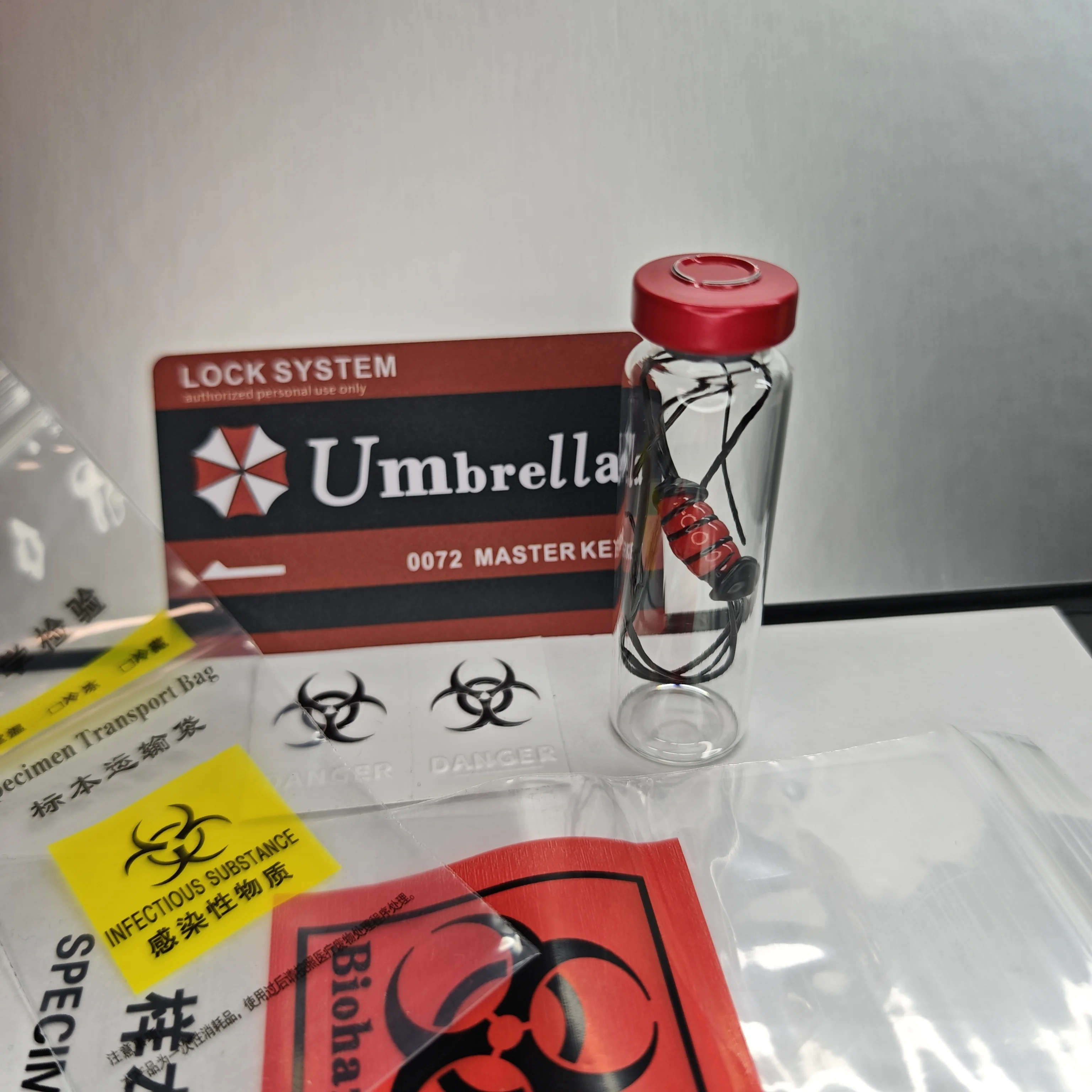 عرض نموذج زجاجة عينة لفيروسات الشر المقيم - هدية قابلة للجمع بشعار شركة المظلة #5