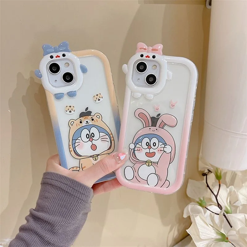 Cute Doraemon Phone Case For IPhone 16 15 14 13 12 11 7 X XR XS Plus Pro Max 3D Bow-knot Little Monster Lens Soft Silicone Cover