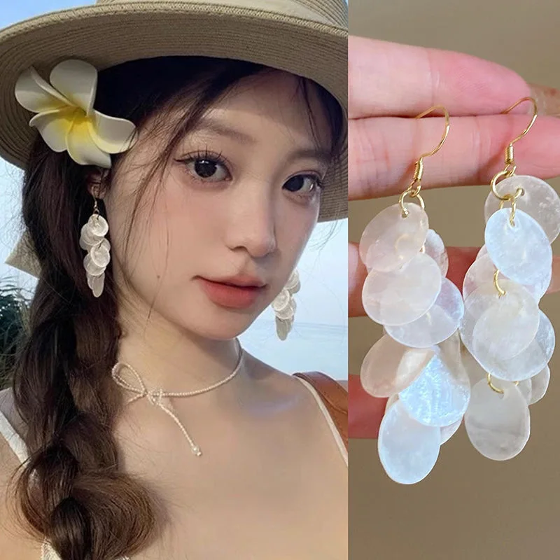 Bohemian-inspired holiday-chic floral niche earrings for women Beachside accessories Fringe earrings with a cascading drape