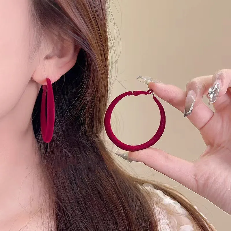 Burgundy flocked round earrings