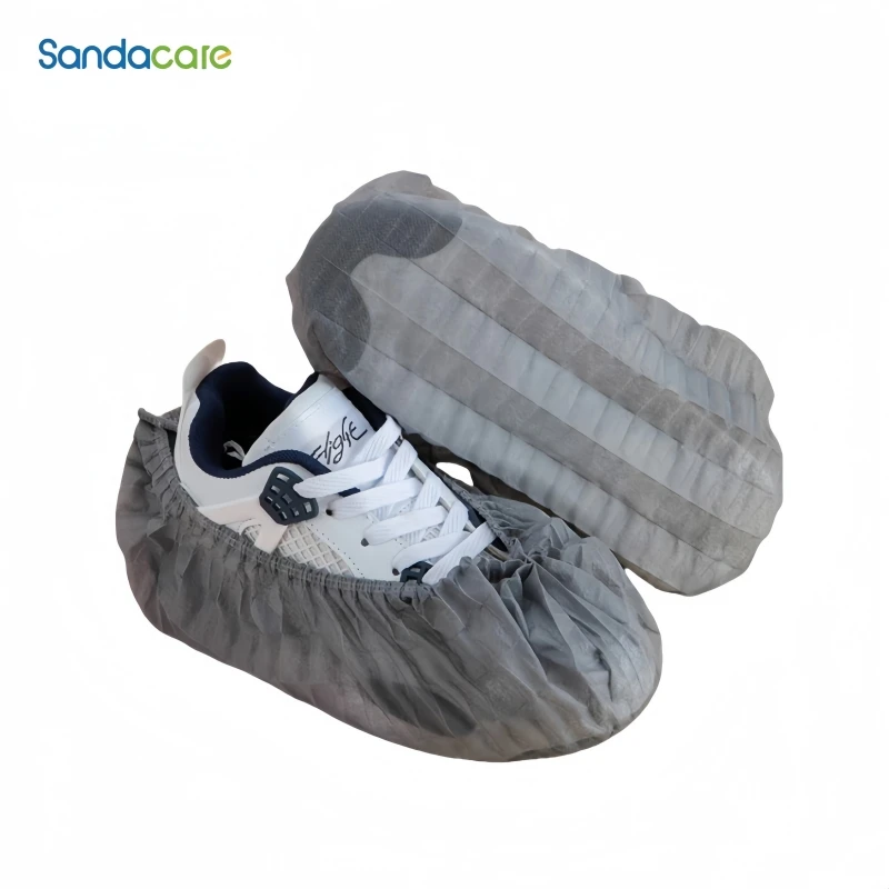 

Утолщенные увеличенные одноразовые бахилы для домашнего использования, противоскользящие, износостойкие, пыленепроницаемые, нетканые бахилы для мастерской