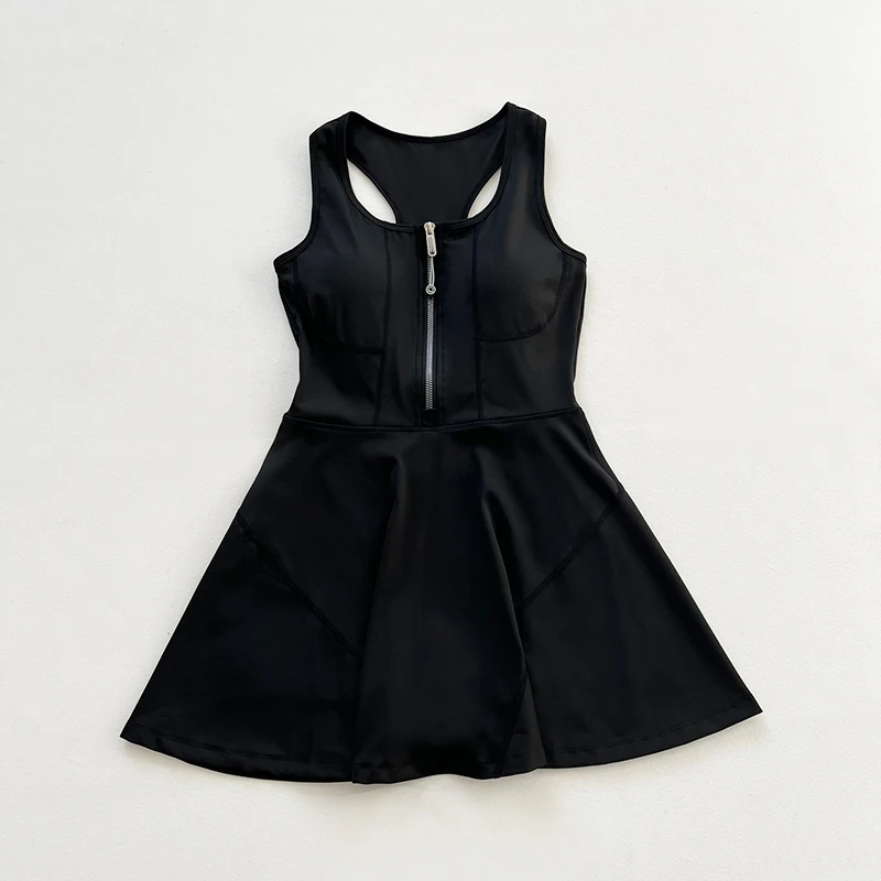 Sleeveless, waist-cinched women's tennis skirt, athletic dress with built-in bra pads and shorts with zipper fly