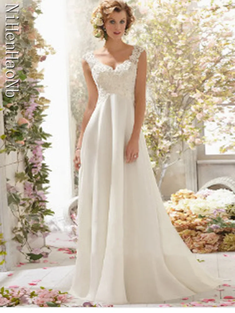 Robe de mariée trapèze classique, col en v, sans manches, avec des appliques en dentelle