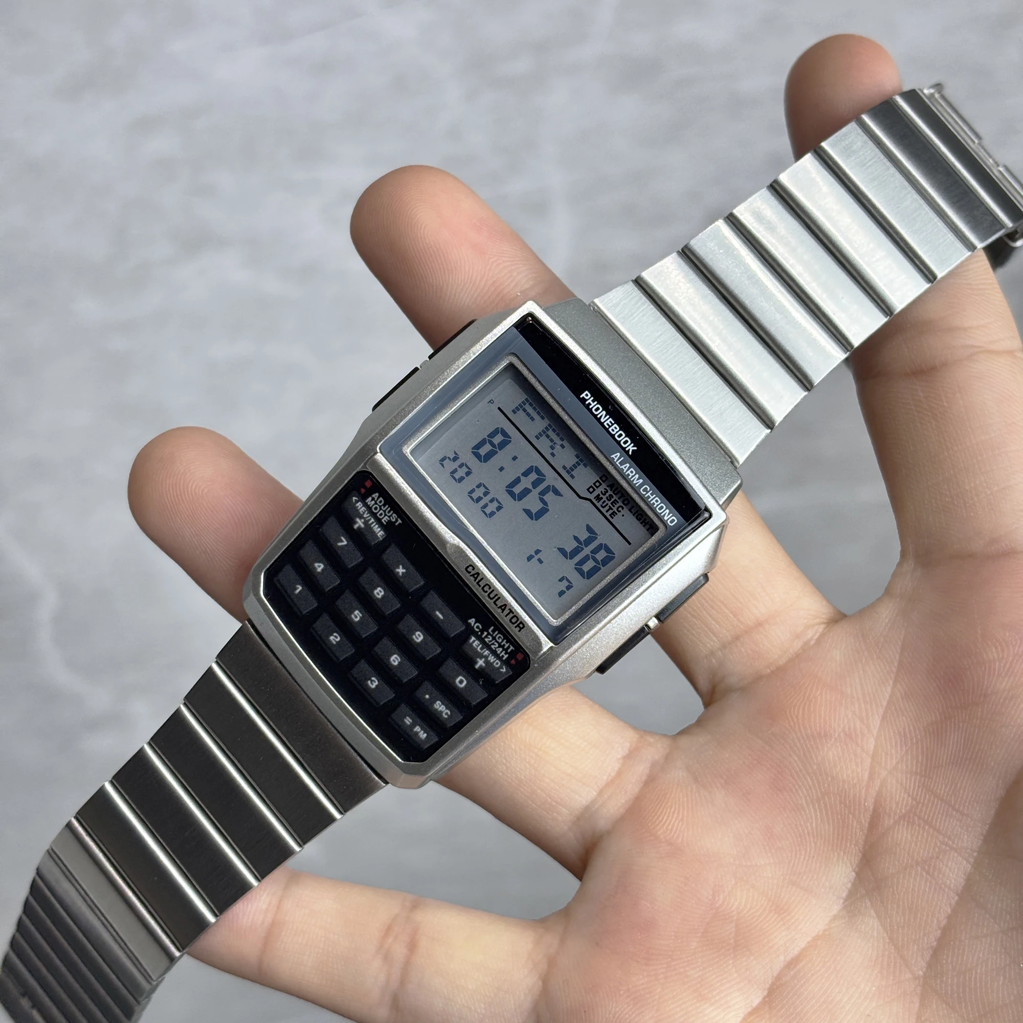 ساعات مصنوعة من سبائك الفولاذ المقاوم للصدأ، ساعات آلة حاسبة رجالية فاخرة، ساعات LED متعددة الوظائف، انفجارات نمط الكمبيوتر