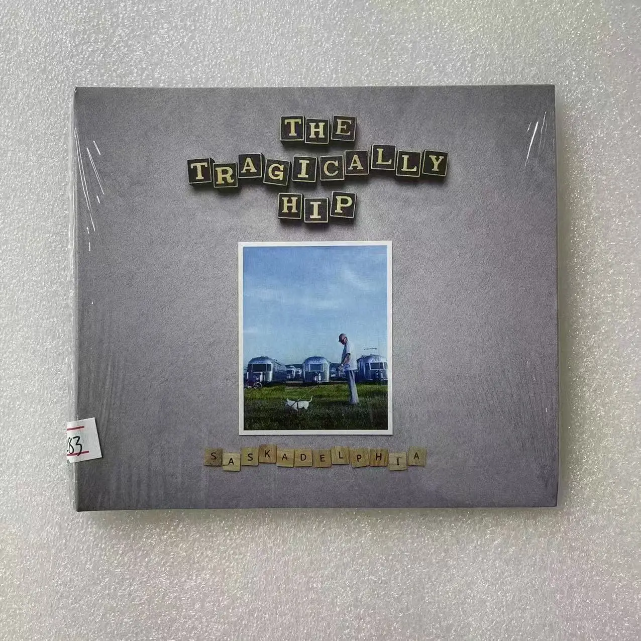 

The Tragically Hip Saskadelphia Music CD Greatest Hits Album Music Record Cosplay Walkman Car Soundtrack Box Party Music