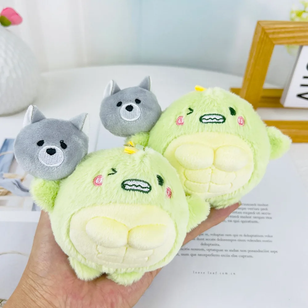 Porte-clés dinosaure vert portant un loup en peluche, pendentif beurre, mignon et drôle, Kawaii