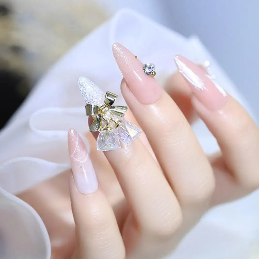 クリスマスネイルチャーム、小さなカラフルな3Dベルとリボンネイルアートデコレーション、DIYマニキュア用クリスマスネイルグリッター、ネイルアート