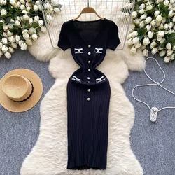 Yuoouoo Chic Fashion Sexy Package Hips Large Stretch Knitted Dress 2026 New Elegant V-neck Buttons Office Lady Bodycon Dresses