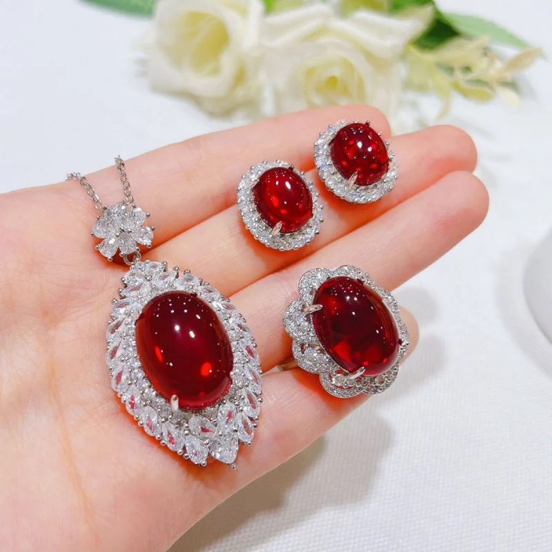 New glossy simulated blood ruby set, exaggerated pigeon egg zircon pendant, colored gemstone earrings, open ring