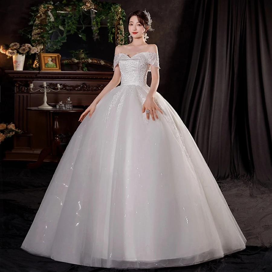 

Bride's main wedding dress 2024 new off shoulder slimming temperament wedding main yarn plus size fluffy trailing dress.(105)