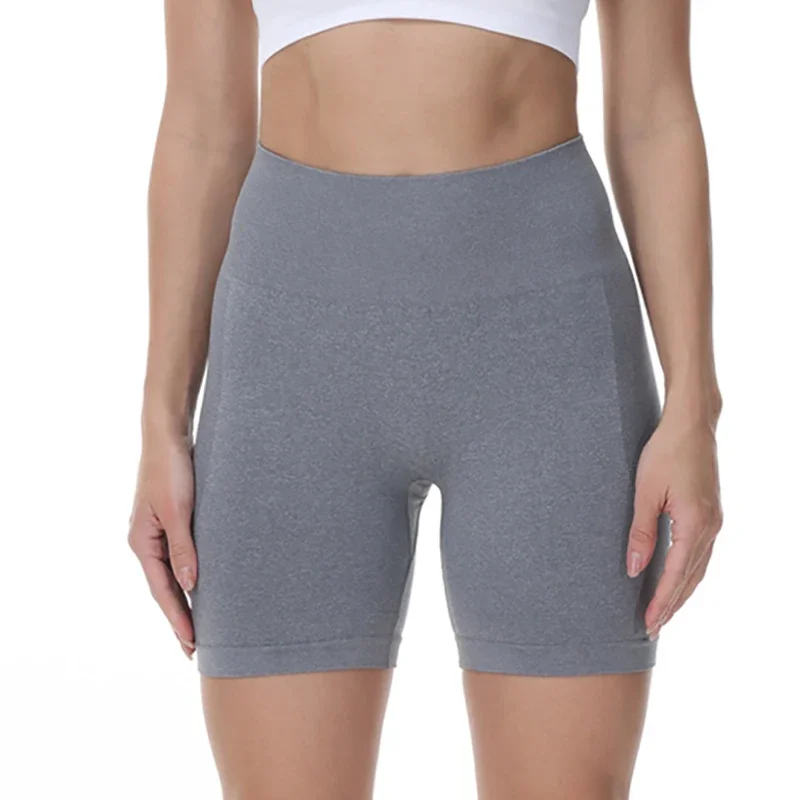 Brzoskwiniowe pośladki Fitness legginsy damskie siłownia sportowe obcisłe spodenki do biegania Hip trzypunktowe spodnie wysokiej talii bezszwowe